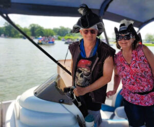 pirates dressed in costume at buckeye lake drining a boat
