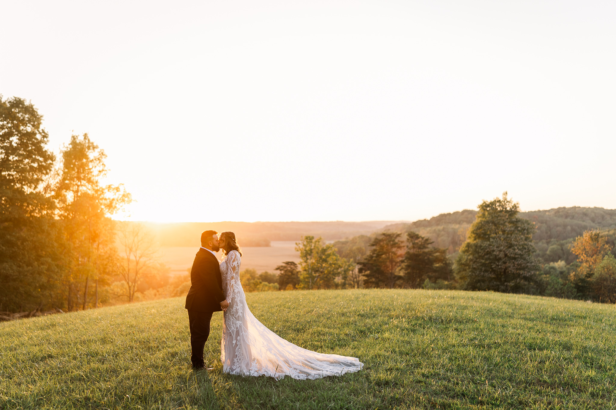 Barn at Rush Creek, couple looking off into the distance