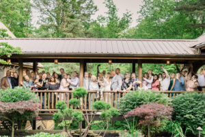 Hocking Hills Wedding Chapel wedding party posing for large group photo