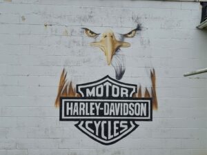 A bald eagle Harley Davidson logo mural.