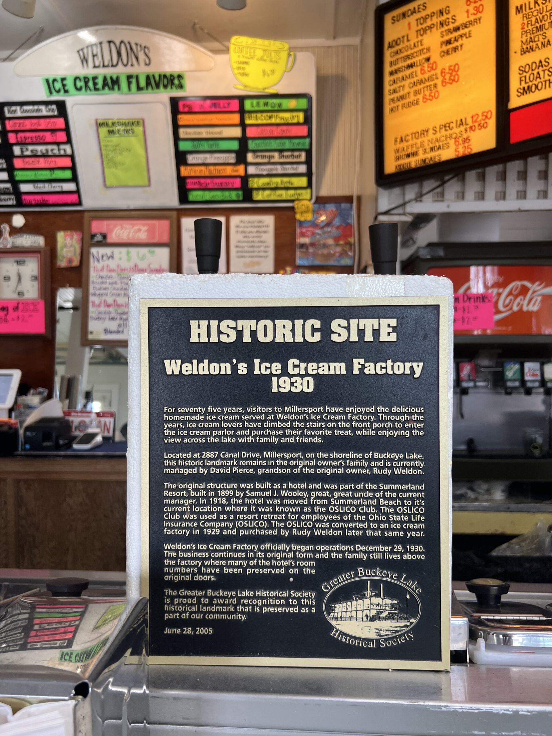 historic plaque sign inside weldons ice cream factory in near buckeye lake in millersport ohio