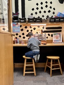 child playing in Mabel's Makery