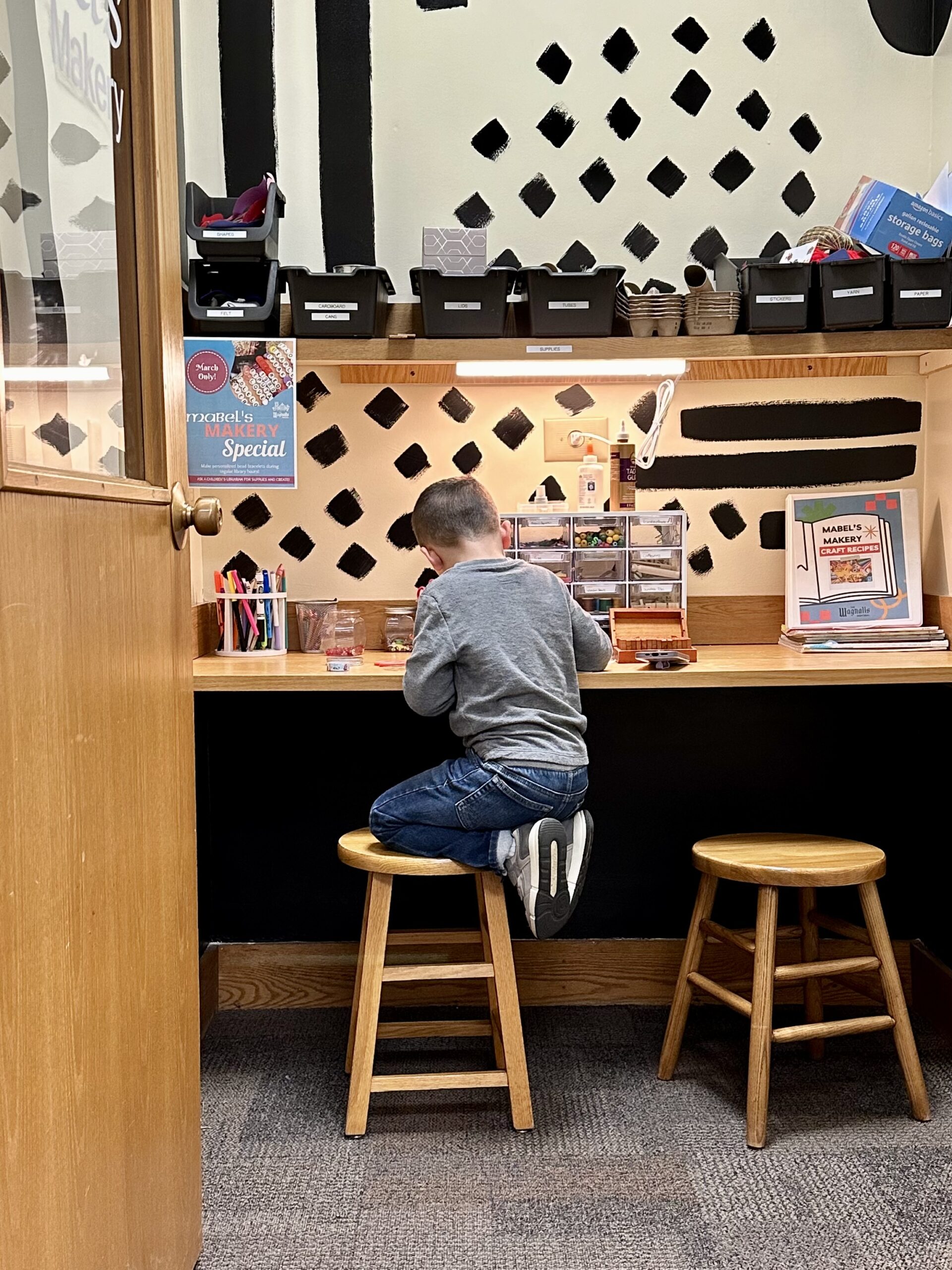 child playing in Mabel's Makery
