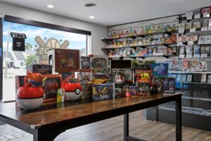 Cards on 6th Hobby Shop interior located in Lancaster Ohio in Fairfield County, display of Pokémon cards and games