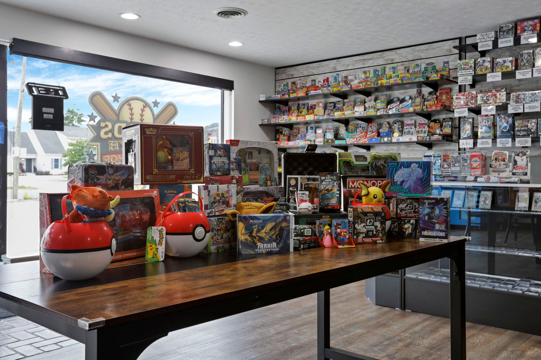 Cards on 6th Hobby Shop interior located in Lancaster Ohio in Fairfield County, display of Pokémon cards and games