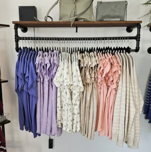 clothing hanging up on a clothing rack - the molt & moon