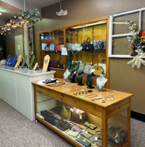 jewelry and other clothing items on display for all saints consignment in lancaster ohio