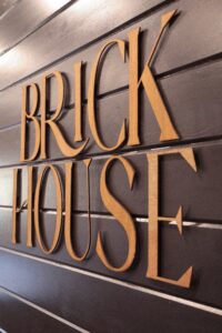 Photo of the logo for the Brick House