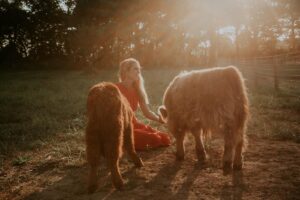 Photo of a women with cows at Buckeye Ridge Rescue & Retreat